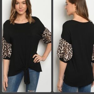 Black top with leopard sleeves new without tags.